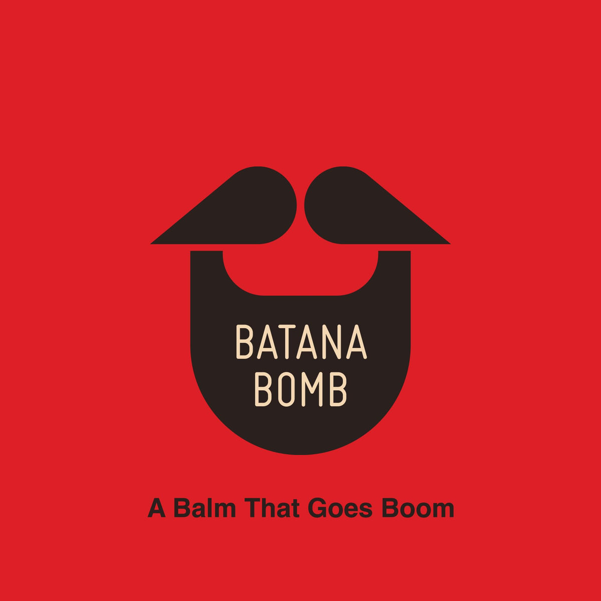 Batana Bomb 4 oz bottle on display for everyday grooming.