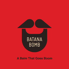 Batana Bomb 4 oz bottle on display for everyday grooming.