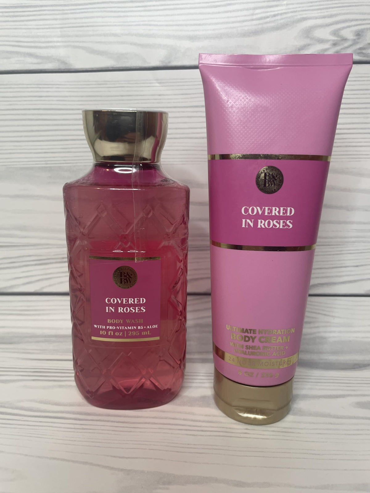 Bath & Body Works Covered In Roses gel wash bottle for refreshing cleanse.