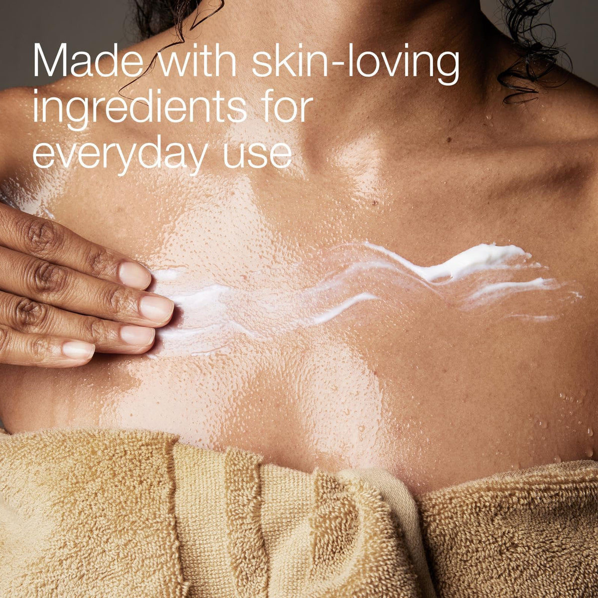 Hands applying Bath & Body Works Gingham Gorgeous lotion for quick absorption.