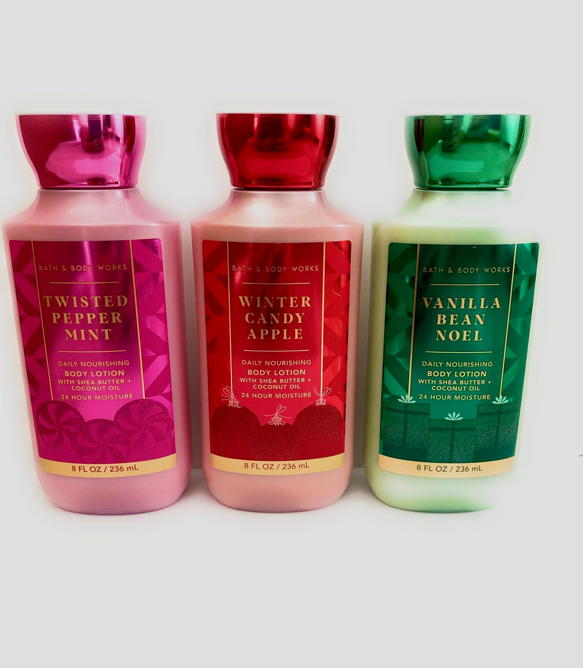 Bath and Body Works Holiday Traditions lotion set: three full-size bottles delivering lasting moisture.
