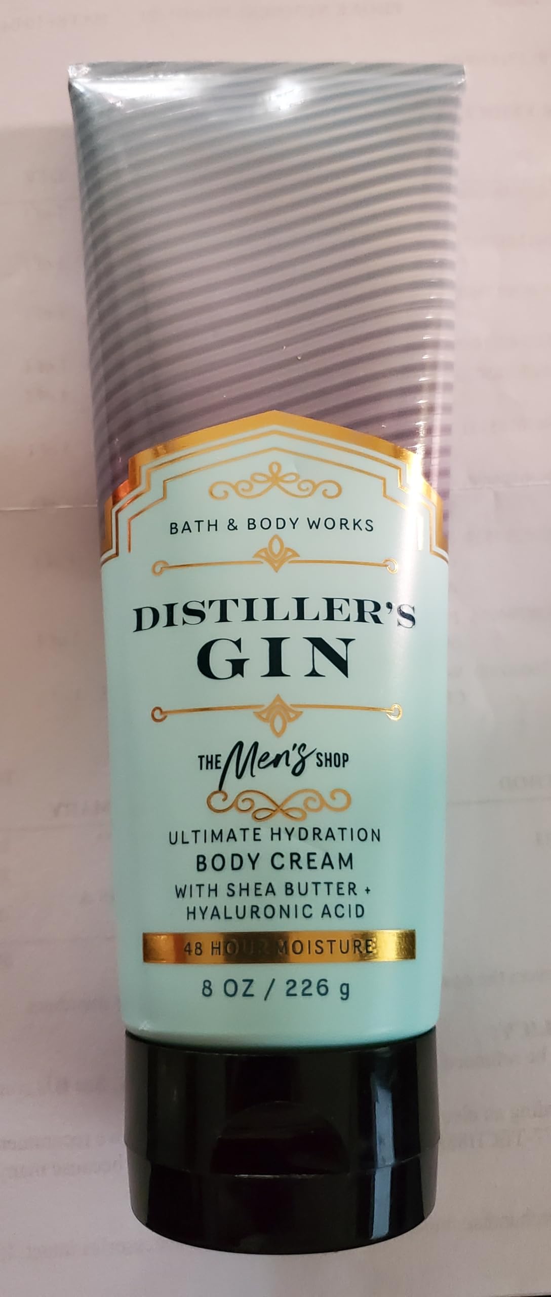 Label close-up of Bath & Body Works Distiller's Gin Cream with citrus notes.