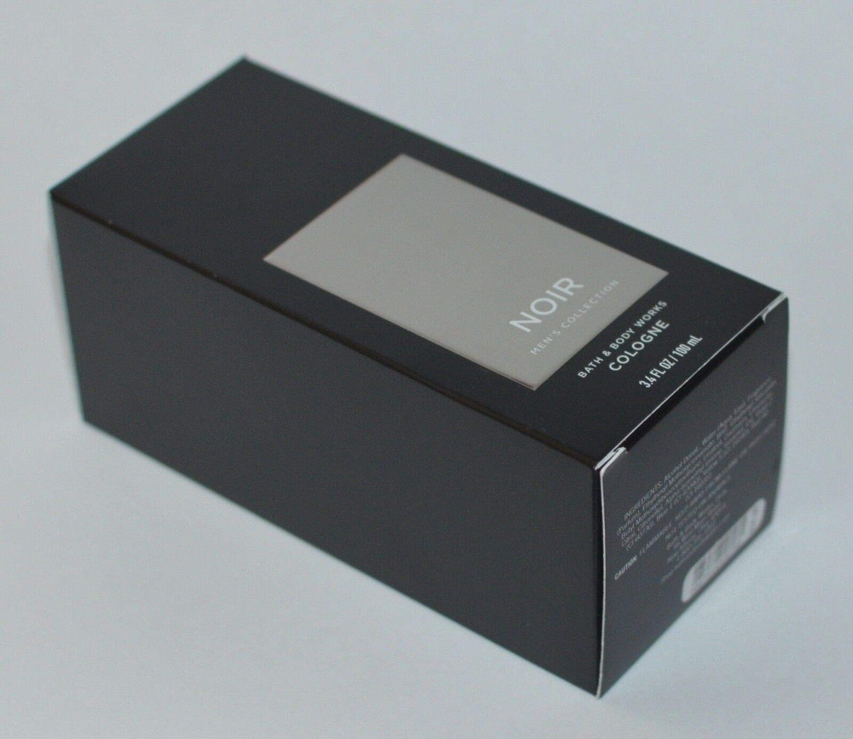 Noir packaging image highlighting brand-new design for premium masculine scent.