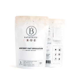 Close-up oats texture in Bathorium Hydration Crush demonstrates gentle skin-softening ingredients.