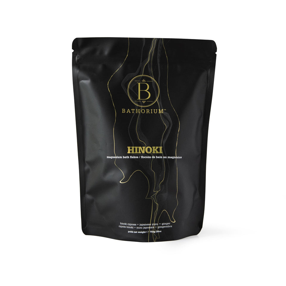 Bathorium Hinoki mineral bath flakes in a 26 oz bag for a relaxing, skin-friendly soak.