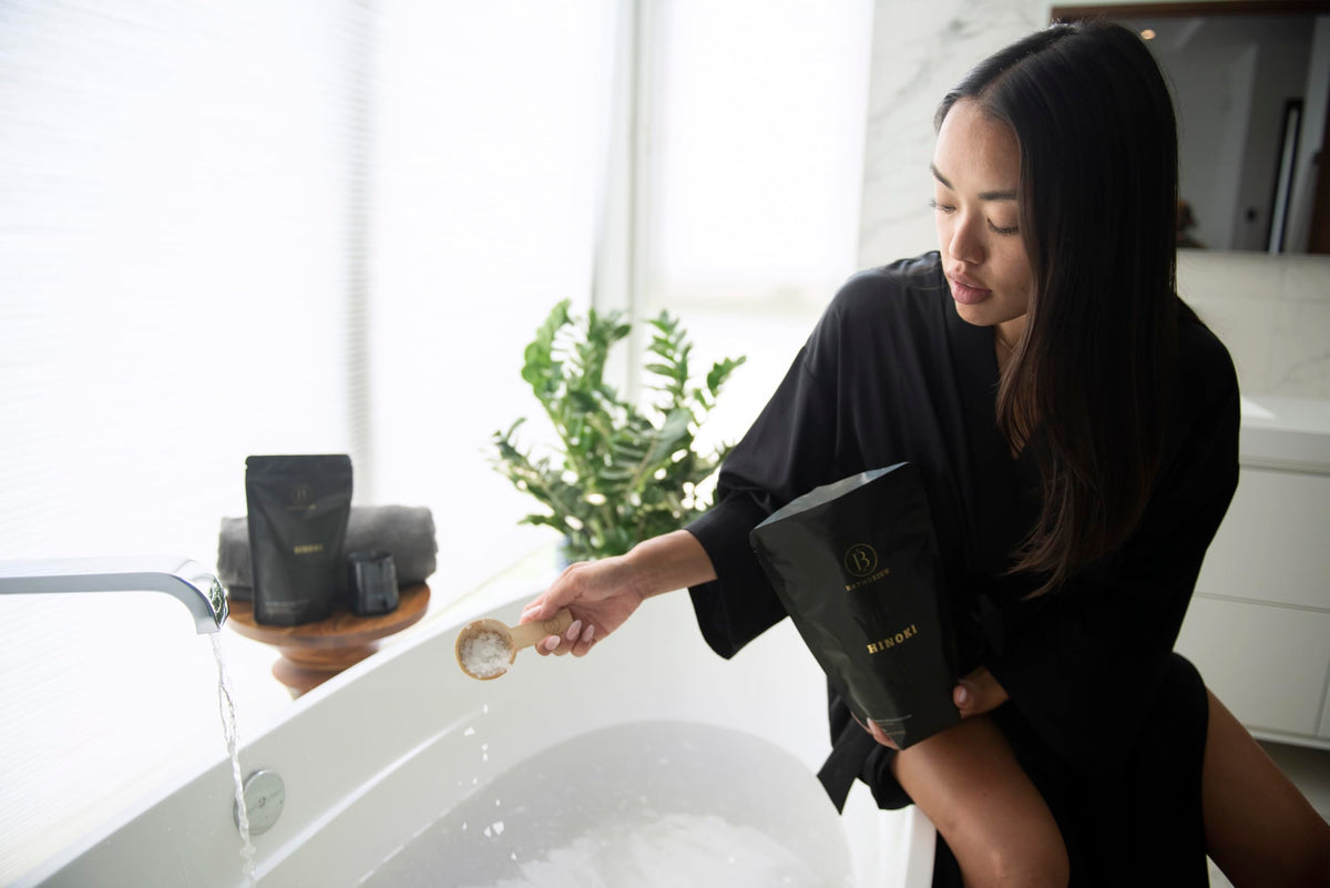Hinoki mineral bath flakes texture close-up highlighting minerals for a gentle soak.