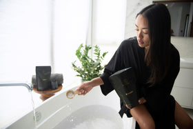 Hinoki mineral bath flakes texture close-up highlighting minerals for a gentle soak.