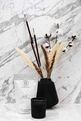 Packaging shot of 23 oz bag highlighting value for about five baths.