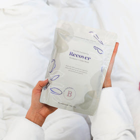 Close-up of Bathorium Recover ingredients: shea butter and minerals
