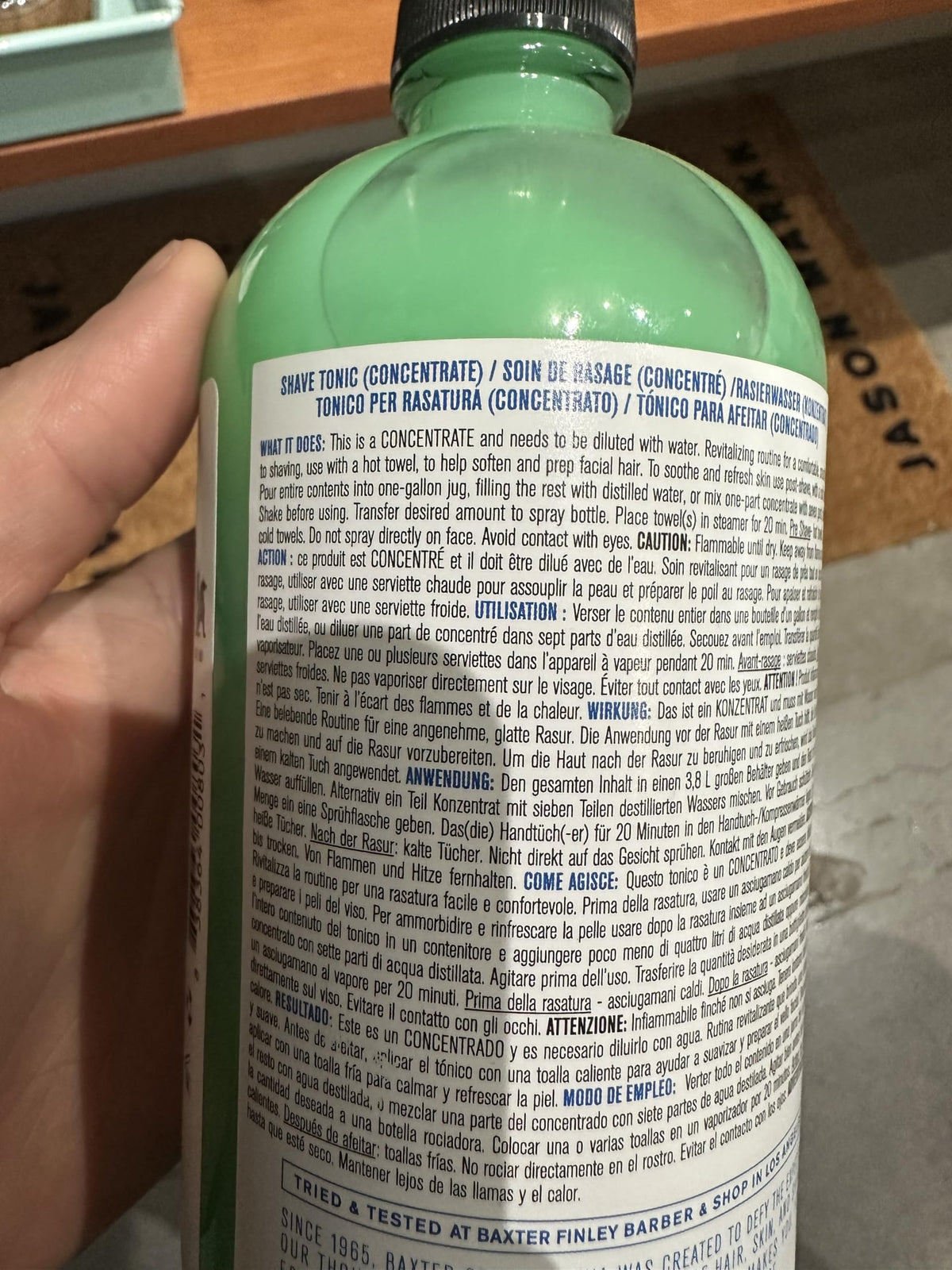 Baxter of California Shave Tonic being applied with fingertips for soothing skin