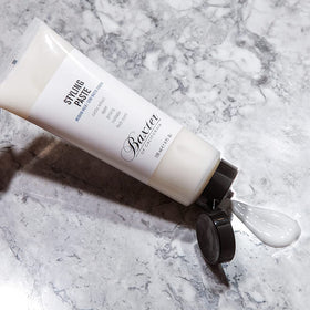 Baxter of California Styling Paste texture close-up showing medium hold and semi-matte finish.
