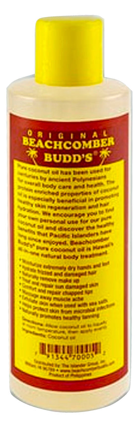 Close-up of Beachcomber Budd's coconut oil being applied for easy skin or hair care.