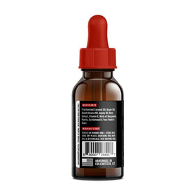 Beard Octane Envy oil drop applying to beard to reduce itch
