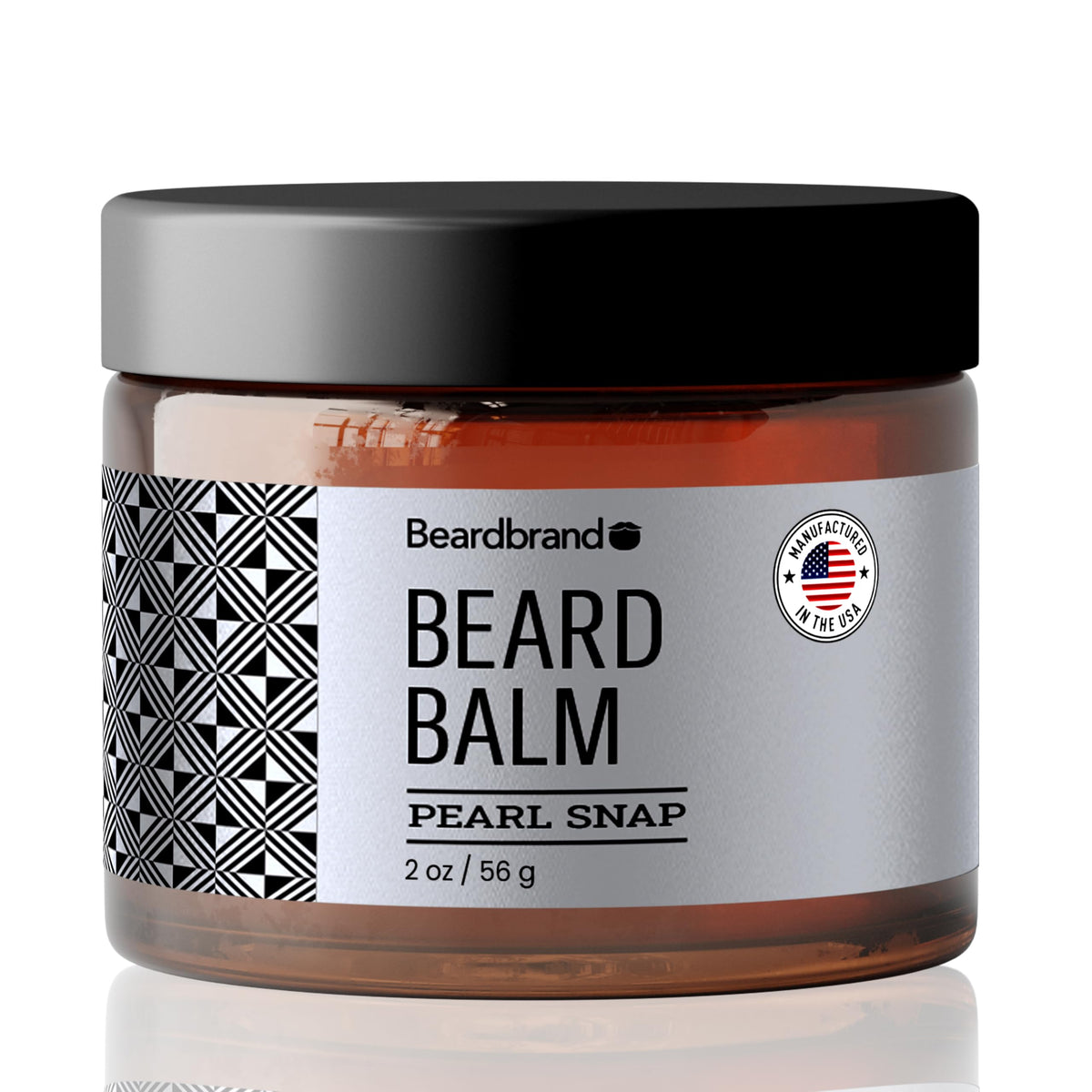 Beardbrand beard balm travel pack jar closeup showing moisturizing formula