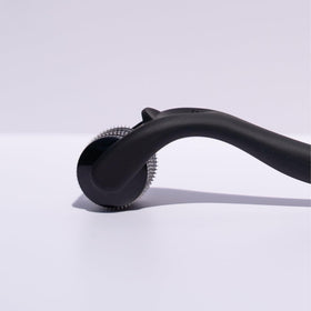 Beautimate microneedle derma roller used on beard area for grooming routines.