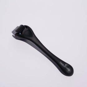 Close up shows 0.25mm needle head for precise, comfortable sessions.