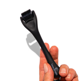 Beautimate microneedle derma roller on face for gentle skin care.