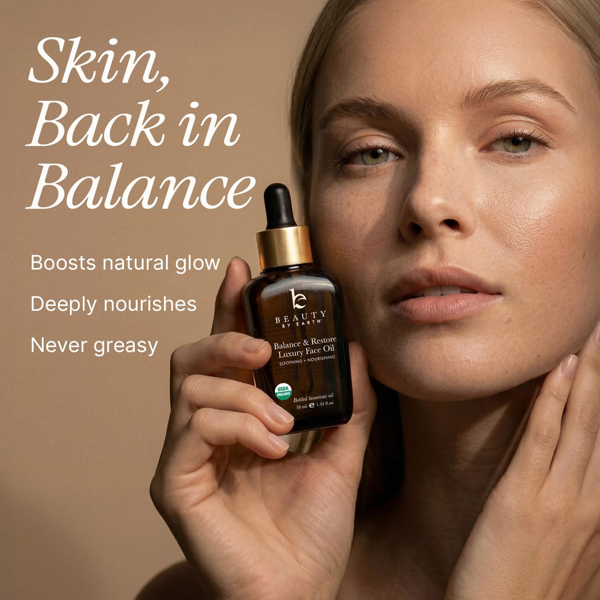 Beauty by Earth balance drops in palm ready for lightweight hydration.