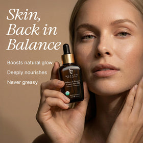 Beauty by Earth balance drops in palm ready for lightweight hydration.