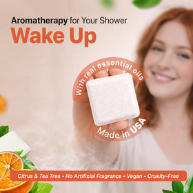 Beauty by Earth shower steamer dissolving tablet in shower, releasing scent.