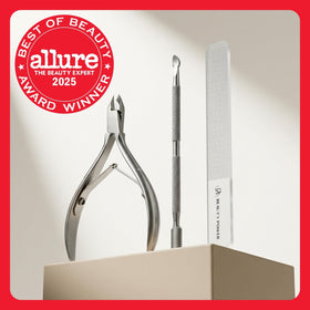 Beauty Power cuticle pusher dual-ended close-up for prep and dead skin removal.