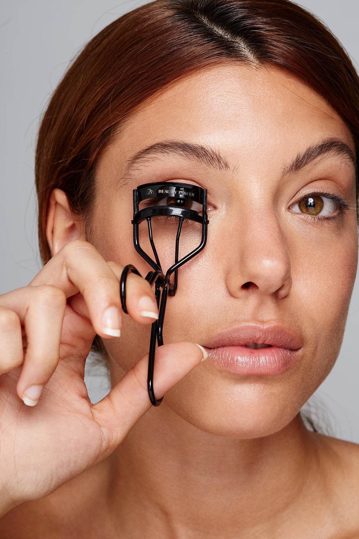 Beauty Power Eyelash Curler travel bag included for on-the-go touch-ups
