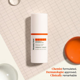 BeautyStat Universal C Eye Perfector being dabbed around the orbital bone for brightening