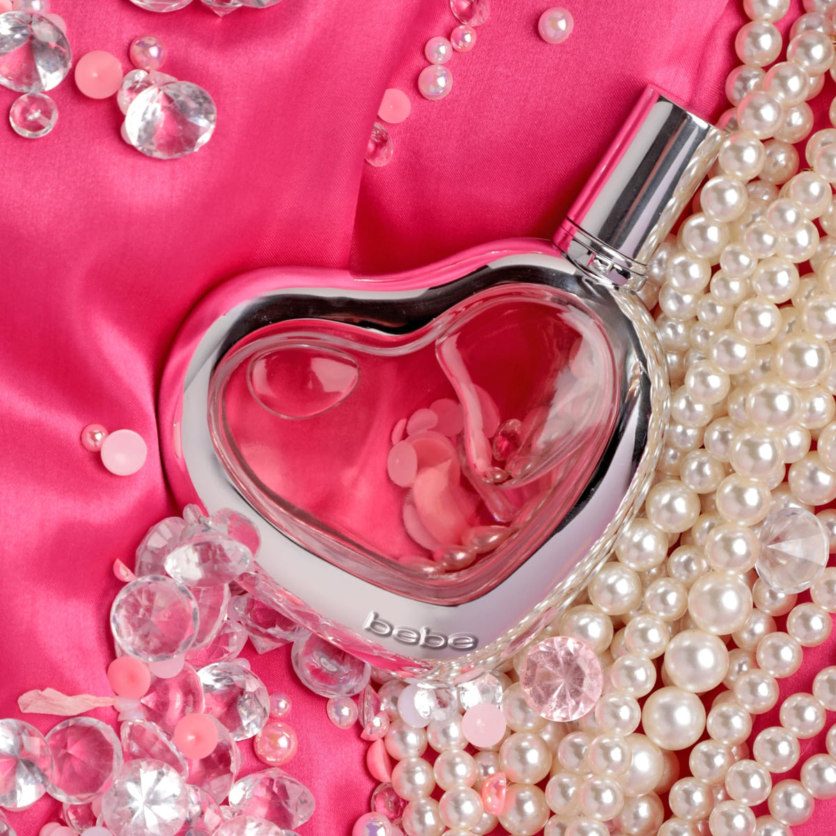 Bebe Silver on display in glass case emphasizes sophisticated fragrance for women.