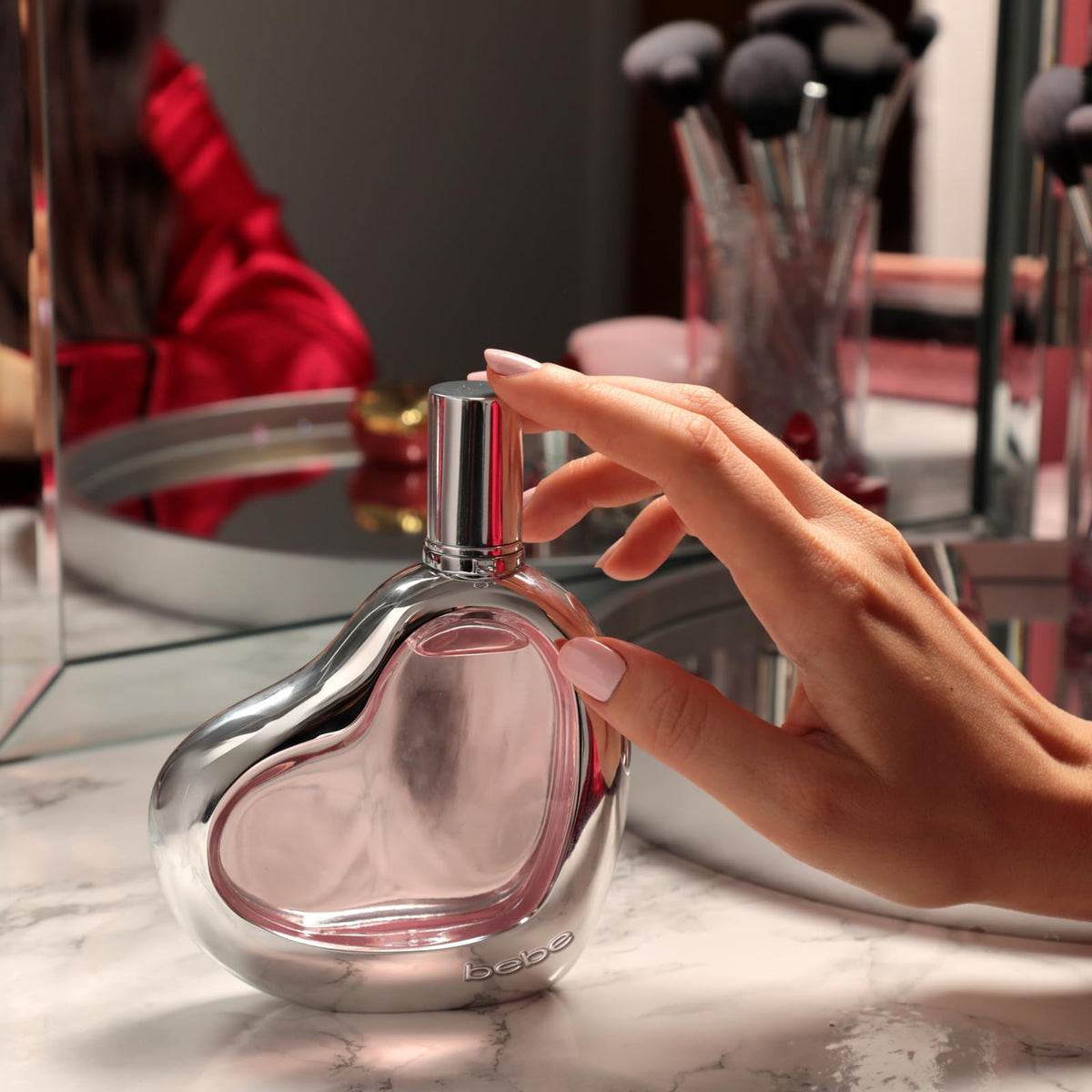 Bebe Silver bottle highlights cedarwood hints for a warm, woody base impression.