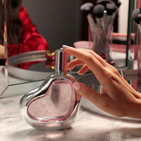 Bebe Silver bottle highlights cedarwood hints for a warm, woody base impression.