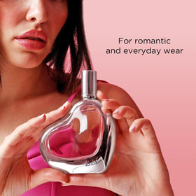 Drops on skin from Bebe Silver hint at fruity floral notes and long-lasting scent.