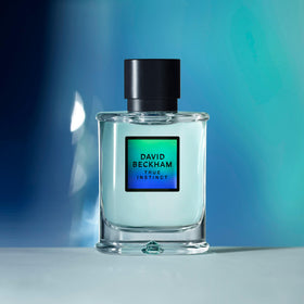 Beckham True Instinct cedarwood note imagery evokes warm masculine depth for evenings