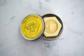 Bee Bar Vanilla 2oz bar ready for quick on-the-go moisture.
