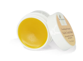 Bottle shows shea butter and beeswax nourishing dry cuticles and nails.