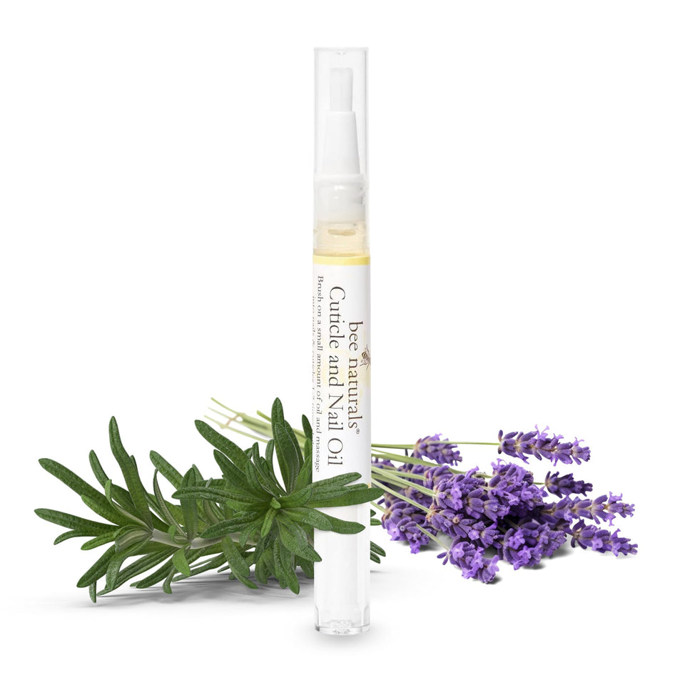 Bee Naturals Quick Fix Cuticle Oil Pen bottle close-up for on-the-go nail nourishment.