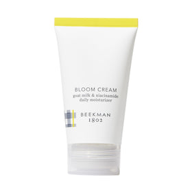 Beekman 1802 Bloom Cream tube front view for lightweight hydration across skin types.