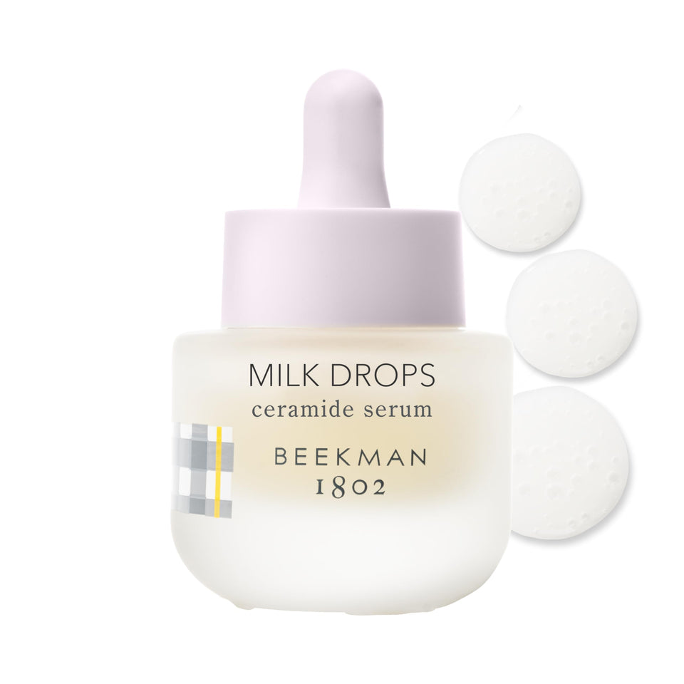 Beekman 1802 Milk Drops serum bottle close-up highlighting hydrating formula