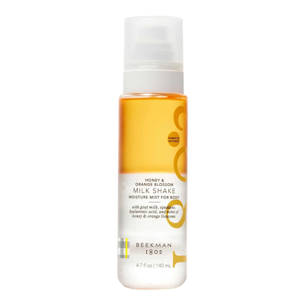 Beekman 1802 Milk Shake Hydrating Body Mist bottle with label offering lightweight hydration for sensitive skin.
