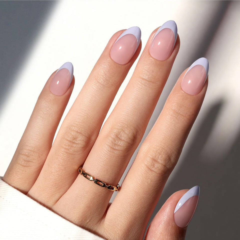 Beetles blue French tips press-on nails in a pastel palette for stylish at-home manicures.