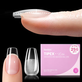 Beetles Tipex Lite coffin short tips with built-in apex for salon-grade strength at home.