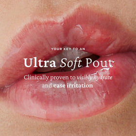 belif Lipcerin closeup gloss on lips emphasizes a hydrated sheen