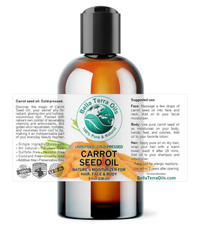 Bella Terra Oils carrot seed oil dropper shows precise application for nourishing hair.