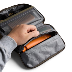 Bellroy Hanging Toiletry Kit magnetic compartment secures small items during travel.