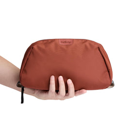 Bellroy Toiletry Kit Plus in Clay color for a stylish, understated travel look.