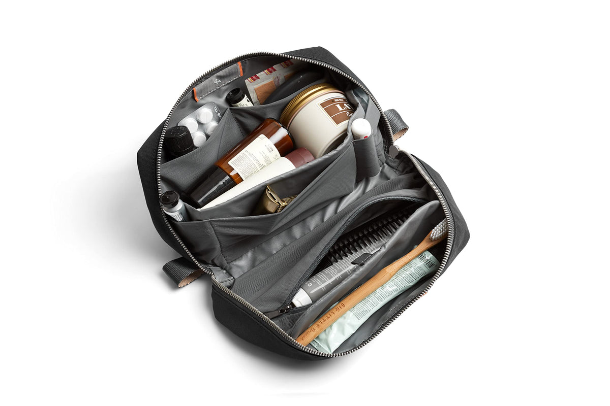 Bellroy Toiletry Kit Plus slate magnetic toothbrush shelf protects toothbrush safely.