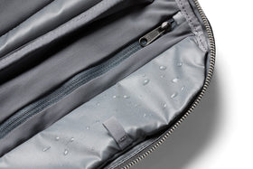 Bellroy Toiletry Kit Plus slate water-resistant fabric protects contents.