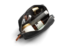Bellroy Toiletry Kit shows toothbrush sleeve with magnetic closure for clean storage.