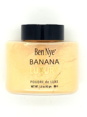 Ben Nye Luxury Powders Banana 1.5oz bottle closeup for smooth application and matte finish.