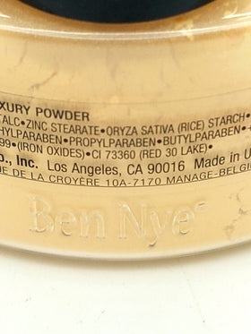 Ben Nye Luxury Powders Banana matte finish closeup highlighting setting power for photo-ready skin.