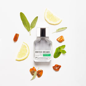 Benetton United Dreams amber bottle on a dresser evokes daily ritual.